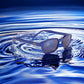 X-KD's 10122 large sunglasses for sportsmen and bikers with a blue metallic frame and blue polycarbonate mirror lenses set on water.